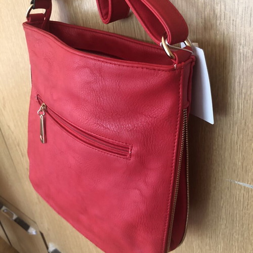 Leather handbag with zipper for expansion, like new, red