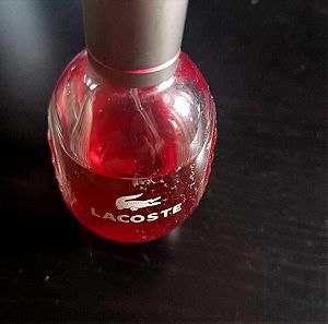 Lacoste red style in play eau de toilette spray  75ml(85% full)
