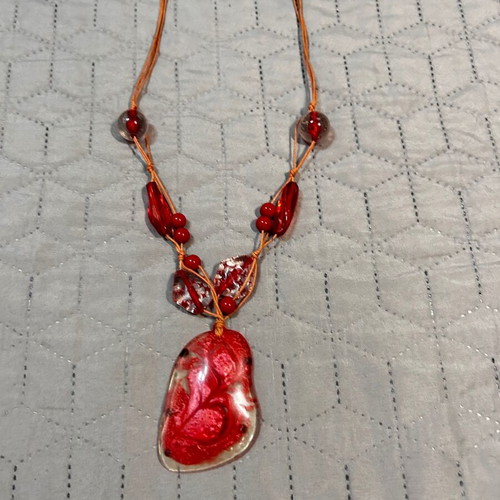 Necklace with red stones like new