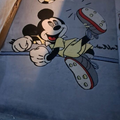 Mickey Mouse Kids Rug like new with vibrant colors
