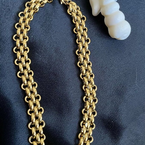 Statement necklace in gold stainless steel, new