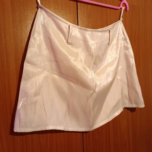 Mini skirt used, iridescent soft pink, size M