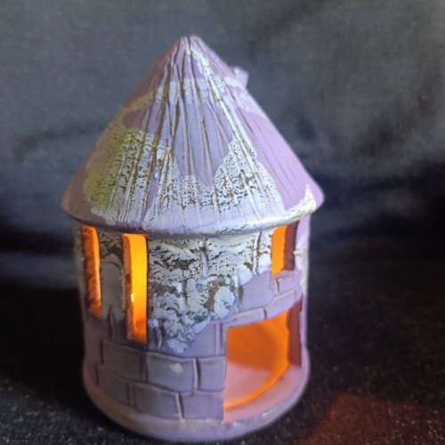 Ceramic house tealight holder used, cozy decor