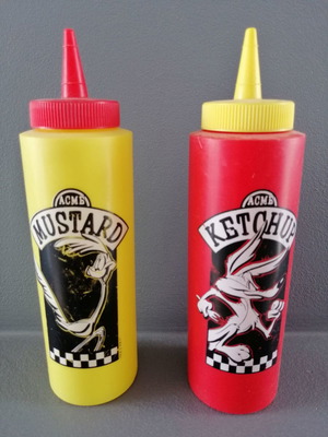 Collectible Road Runner ketchup and mustard bottles used