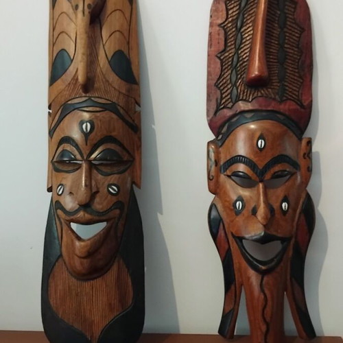 Pair of large handmade African masks from solid wood like new