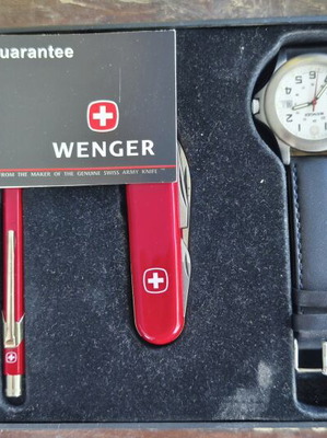 Wenger set with watch, pen, and pocket knife used