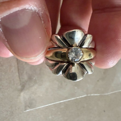 Silver and gold ring with diamond used
