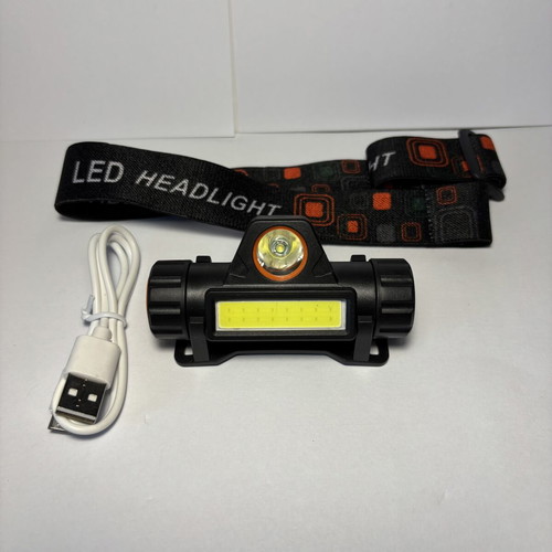 Rechargeable LED headlamp with strap and charging cable