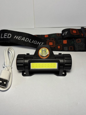Rechargeable LED headlamp with strap and charging cable