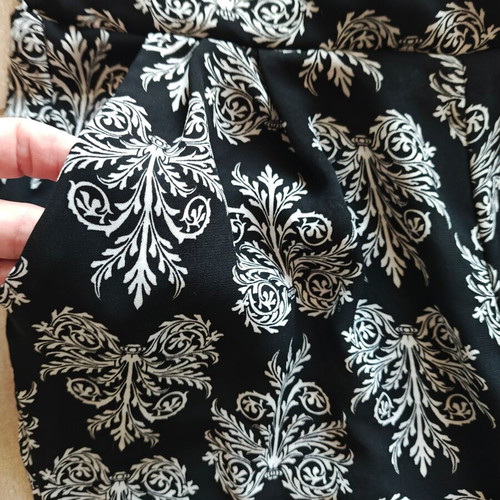Flowy pants with black and white pattern, size S