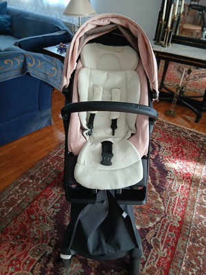 Stokke limited edition baby stroller used, soft pink with pistachio details