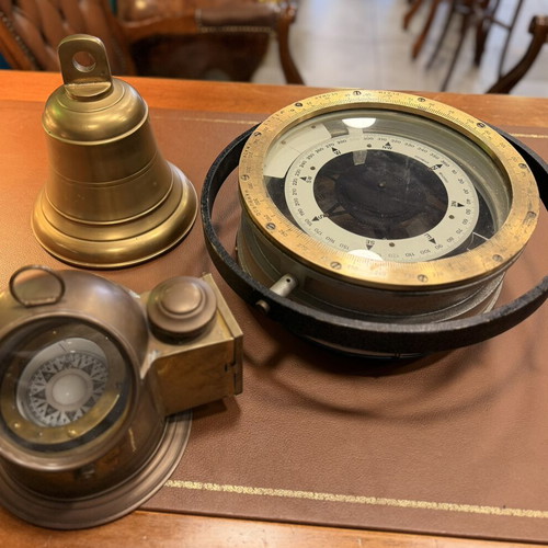 Nautical items like new: bell, gyroscopic compass, illuminated compass