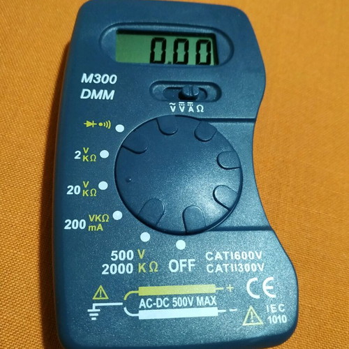 Digital mini pocket multimeter like new with 12v battery and case