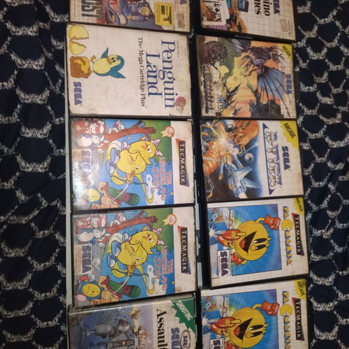 Master System games 9 with 10 cases, unknown condition