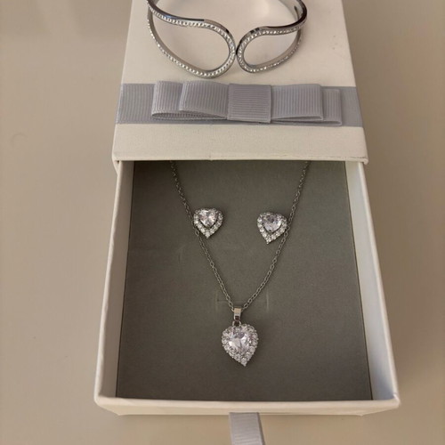 Jewelry set new with earrings, necklace and bracelet