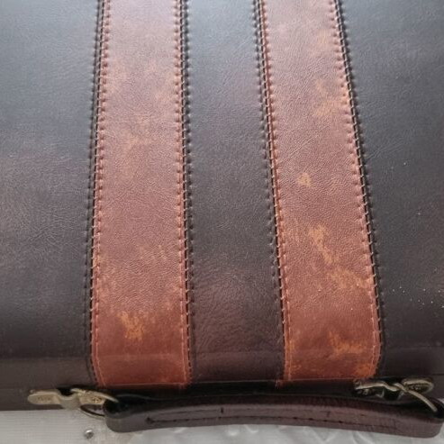 BACKBOARD IN A LEATHER CASE