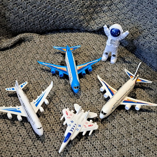Plastic airplane set, spaceship and astronaut used