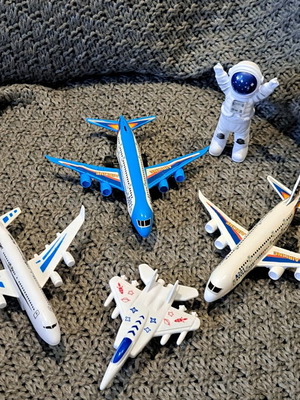 Plastic airplane set, spaceship and astronaut used