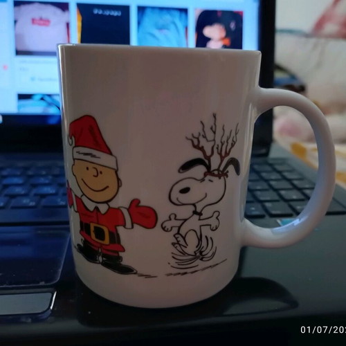 Butlers Snoopy mug with Christmas designs like new