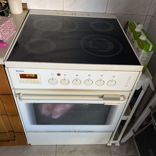 Oven used with four burners