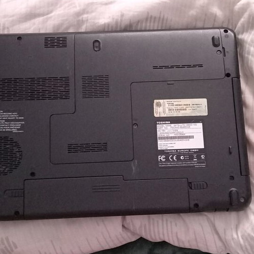 Toshiba Satellite C660D-10D laptop used with charger and accessories