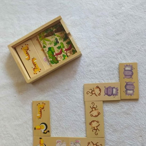 Wooden domino with animals used, in wooden box