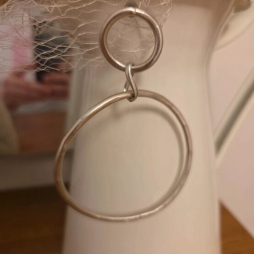 Earrings, bracelet and necklace used, silver color