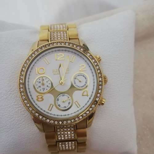 Revello women's watch new, gold color