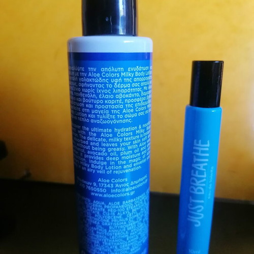 Body lotion and roll-on perfume set, new