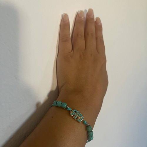 Handmade turquoise bracelet with elephant charm adjustable