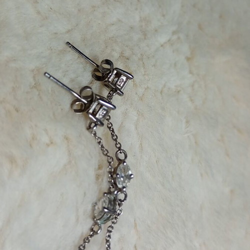 Silver earrings with white and turquoise stones used