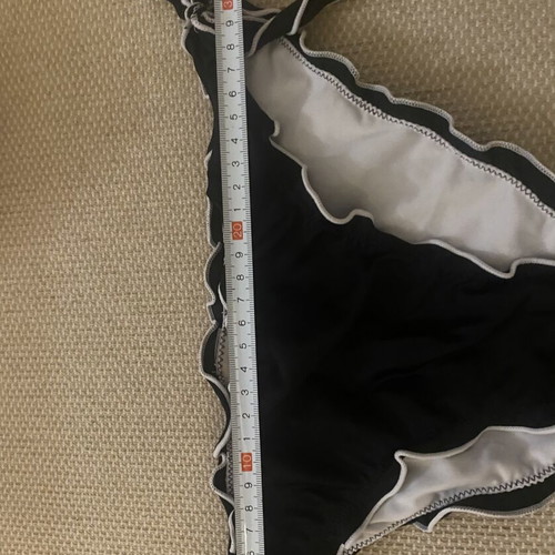 M&D black swimsuit used, fits small and medium sizes