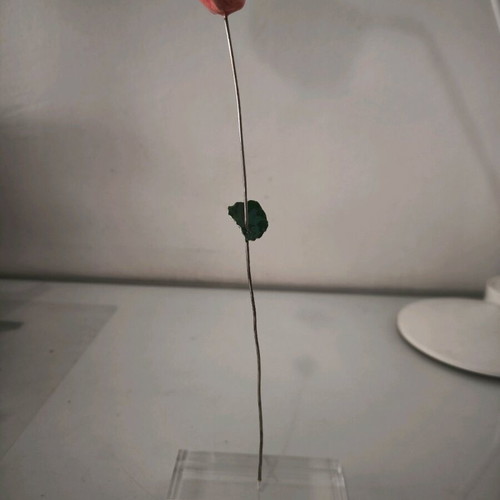 Metal rose decorative piece on plexiglas base, new