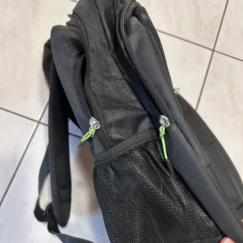 Backpack almost unused, black and green