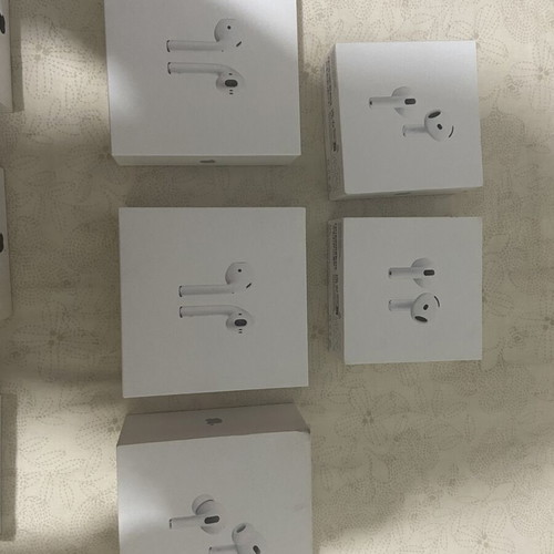 iPhone empty boxes set with AirPods and Apple Watch packaging