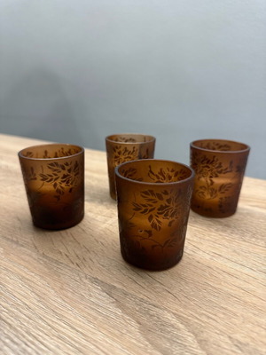 Set of 4 used candles with glass jar brown color