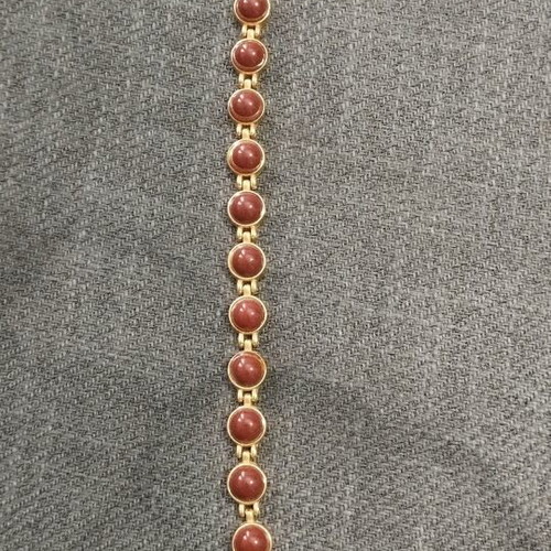 Vintage women's bracelet with red/brown cabochon beads on gold base, like new