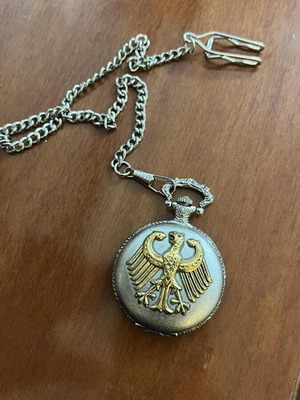 Vintage pocket watch like new with chain and embossed eagle design