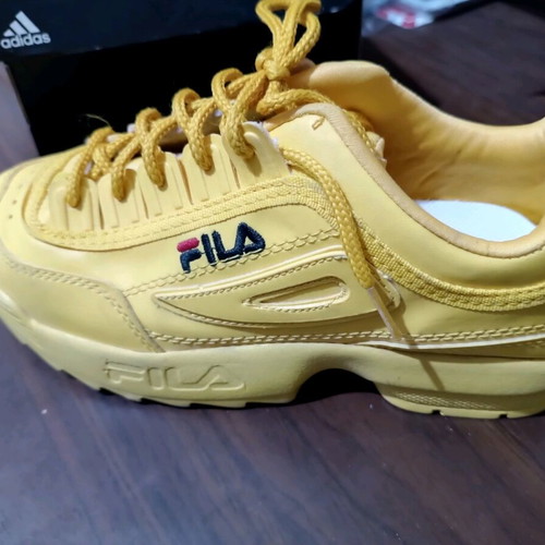 Fila athletic shoes yellow size 38 like new
