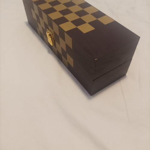 Wooden wine case used with travel chess set