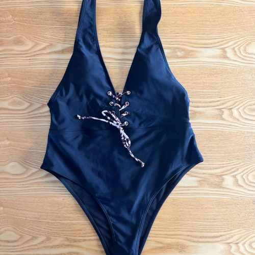 Black one-piece swimsuit with animal print cord, size L, like new