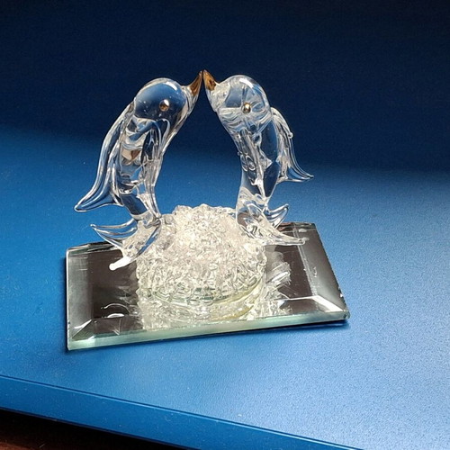 Glass figurines dolphin and duck used, mirror base
