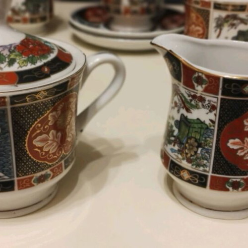 Japanese tea set with 6 cups, sugar bowl and creamer like new