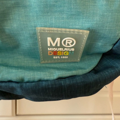 Children's school backpack used with multiple compartments and supportive back
