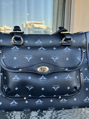 La Tour Eiffel Handbag like new, black
