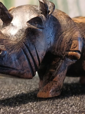 Rhinoceros sculpture made of hard heavy wood like new