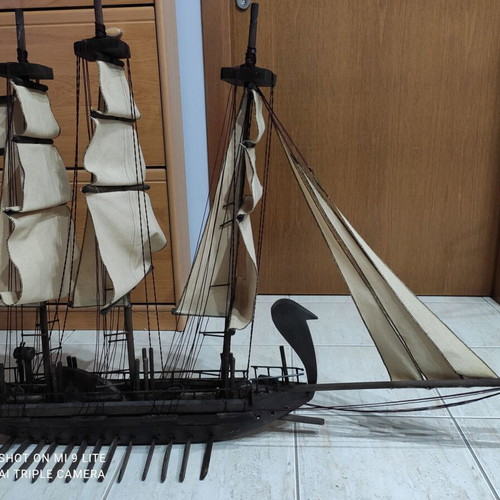 Handmade wooden sailboat used