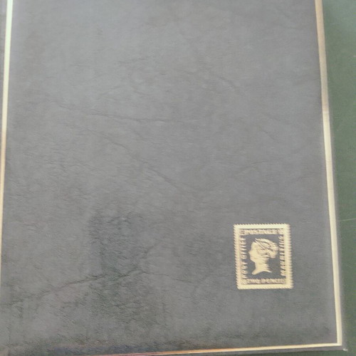 Stamp collection album like new, dark green leather-bound