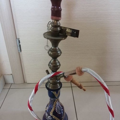 Oriental hookah used with stained glass bottle