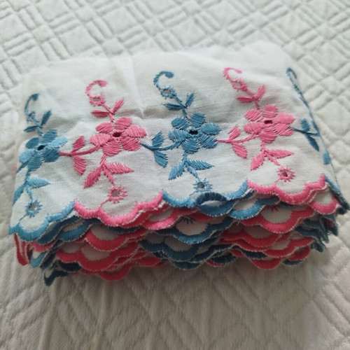 Cotton machine lace with pink and blue flowers